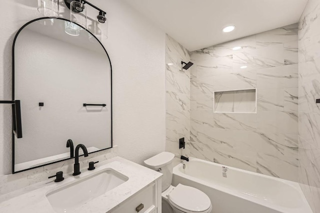 16825 Hamilton Point Cir, Manor, TX 78653 - bathroom with vanity, bathing tub / shower combination, and recessed lighting