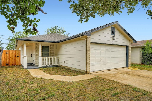 16825 Hamilton Point Cir, Manor, TX 78653 - ranch-style home featuring an attached garage, concrete driveway, a porch, and roof with shingles