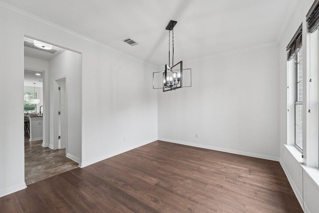 1508 Australis Cv, Austin, TX 78732 - unfurnished dining area with wood finished floors, a chandelier, and ornamental molding