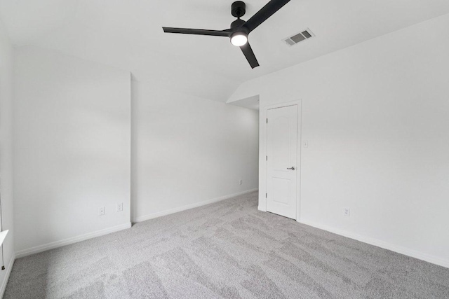 1508 Australis Cv, Austin, TX 78732 - carpeted spare room featuring ceiling fan and vaulted ceiling