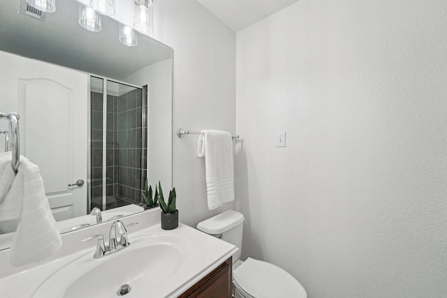 1508 Australis Cv, Austin, TX 78732 - full bath with a shower with door, vanity, and a textured wall