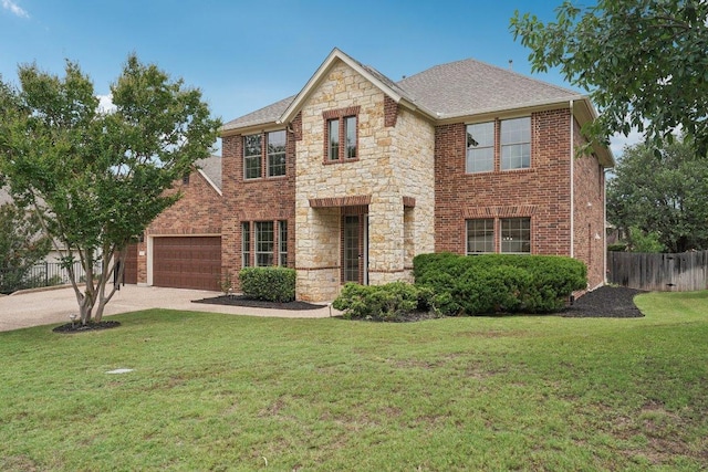 1508 Australis Cv, Austin, TX 78732 - view of front of house featuring driveway, an attached garage, stone siding, brick siding, and a shingled roof