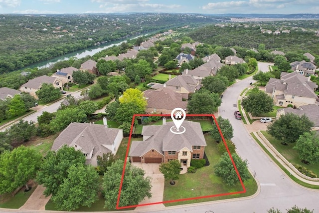 1508 Australis Cv, Austin, TX 78732 - aerial perspective of suburban area with property boundaries highlighted and a large body of water