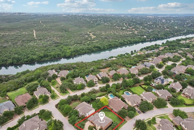 1508 Australis Cv, Austin, TX 78732 - aerial perspective of suburban area with property boundaries highlighted and a large body of water