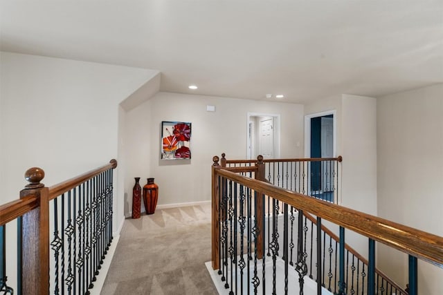 11404 Terrace Meadow Way, Manor, TX 78653 - corridor with an upstairs landing, light colored carpet, and recessed lighting