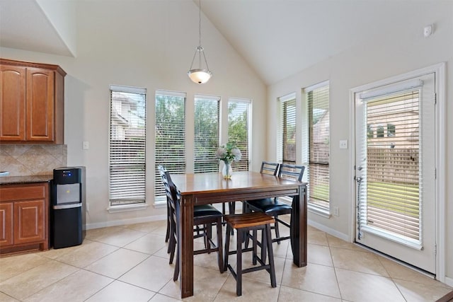 11404 Terrace Meadow Way, Manor, TX 78653 - dining area featuring high vaulted ceiling and light tile patterned floors
