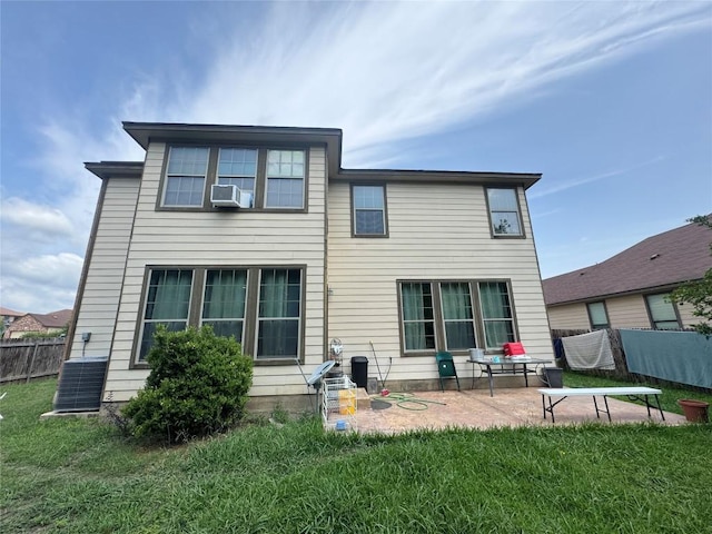 769 Apricot Dr, Kyle, TX 78640 - back of property featuring a patio and cooling unit
