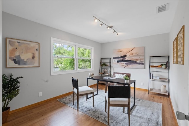 5317 Harvest Ln, Austin, TX 78745 - office with rail lighting and wood finished floors