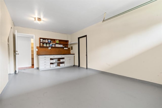 5317 Harvest Ln, Austin, TX 78745 - unfurnished living room featuring concrete flooring