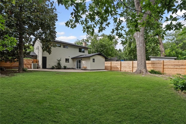 5317 Harvest Ln, Austin, TX 78745 - rear view of property featuring a patio area and a chimney