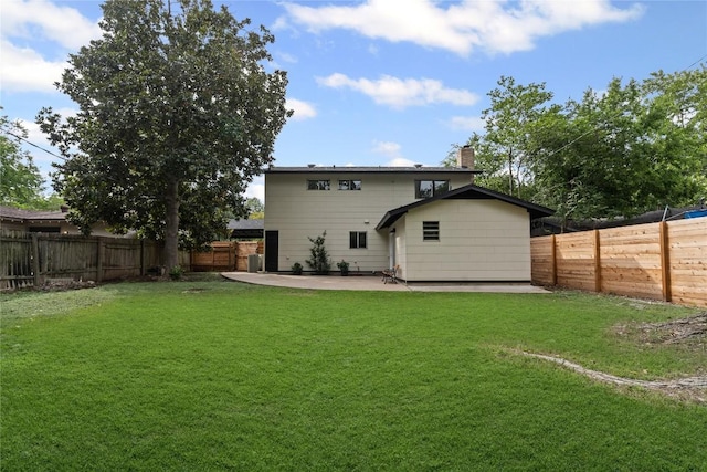 5317 Harvest Ln, Austin, TX 78745 - back of house with a chimney, a patio, and a fenced backyard