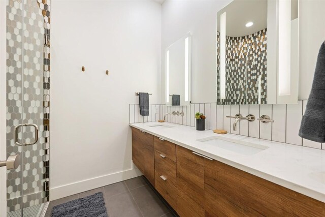 4103 Ridgelea Dr, Austin, TX 78731 - full bathroom with double vanity, tile patterned flooring, a stall shower, and tasteful backsplash