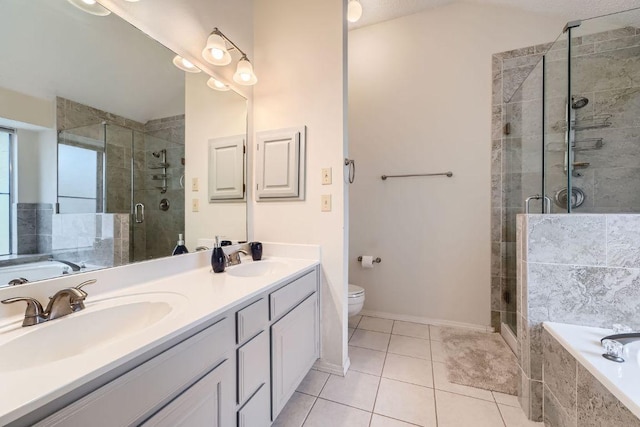 12711 Possum Hollow Dr, Austin, TX 78729 - full bath featuring double vanity, a bath, a shower stall, and tile patterned floors