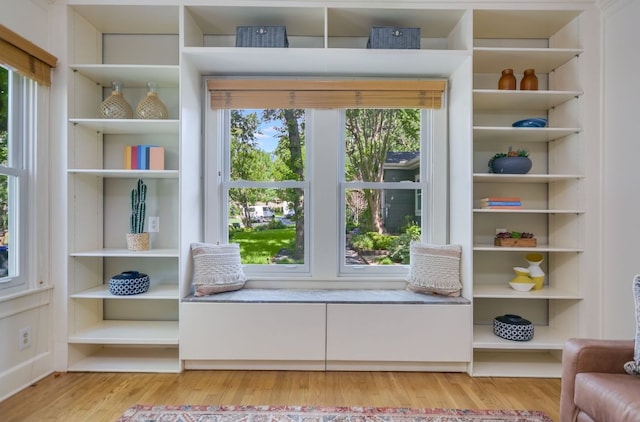 2702 Bonnie Rd, Austin, TX 78703 - sitting room featuring healthy amount of natural light and wood finished floors