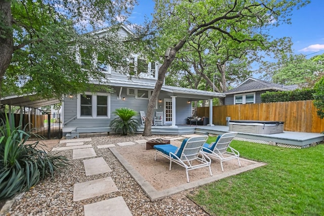 2702 Bonnie Rd, Austin, TX 78703 - rear view of house with a hot tub, a deck, and a patio