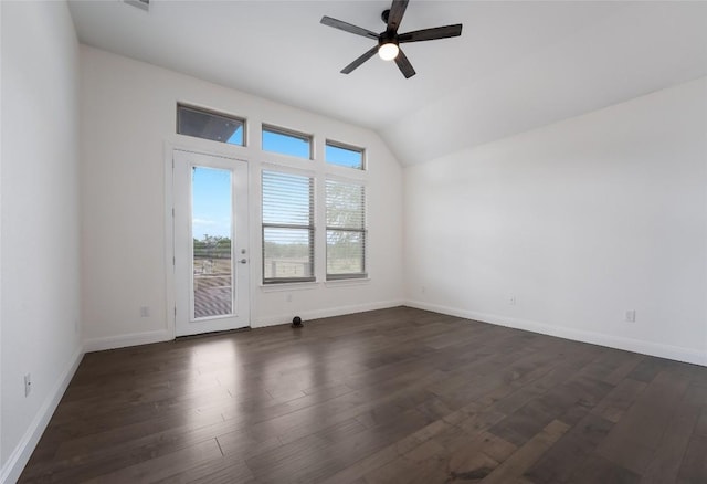 212 Ferryboat Ln, New Braunfels, TX 78130 - spare room featuring dark wood-type flooring, ceiling fan, and vaulted ceiling