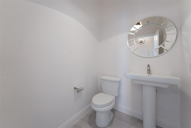 212 Ferryboat Ln, New Braunfels, TX 78130 - bathroom with toilet and baseboards