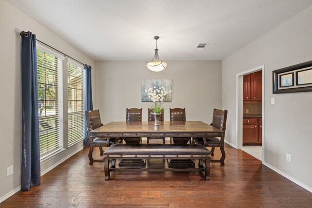 1802 Tall Chief, Leander, TX 78641 - dining room featuring hardwood / wood-style flooring and baseboards