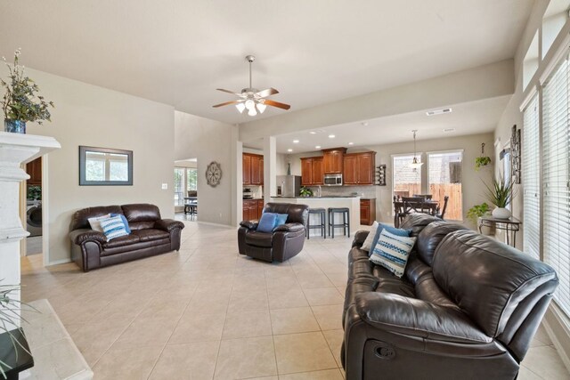 1802 Tall Chief, Leander, TX 78641 - living room featuring ceiling fan, light tile patterned flooring, and recessed lighting