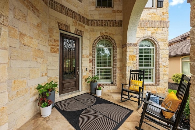 4605 Bat Falcon Dr, Austin, TX 78738 - view of exterior entry with stone siding