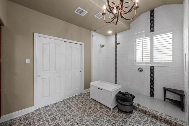 4605 Bat Falcon Dr, Austin, TX 78738 - full bathroom featuring a walk in shower, a chandelier, and vaulted ceiling