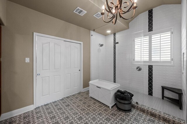4605 Bat Falcon Dr, Austin, TX 78738 - full bathroom with a walk in shower, a chandelier, and lofted ceiling