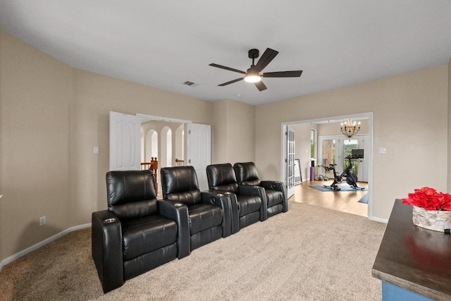 4605 Bat Falcon Dr, Austin, TX 78738 - cinema featuring light colored carpet, french doors, a ceiling fan, and a chandelier