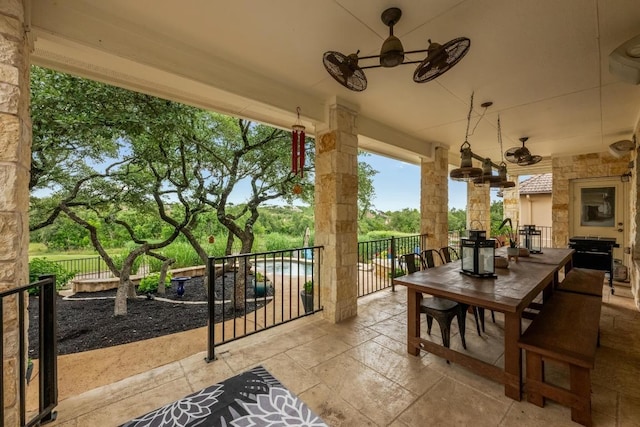 4605 Bat Falcon Dr, Austin, TX 78738 - view of patio with a ceiling fan and outdoor dining space