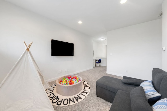 2705 Pyramid Dr, Austin, TX 78734 - carpeted living room with recessed lighting and baseboards