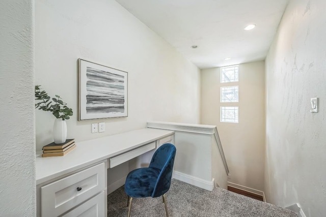 2705 Pyramid Dr, Austin, TX 78734 - carpeted home office with built in desk and baseboards
