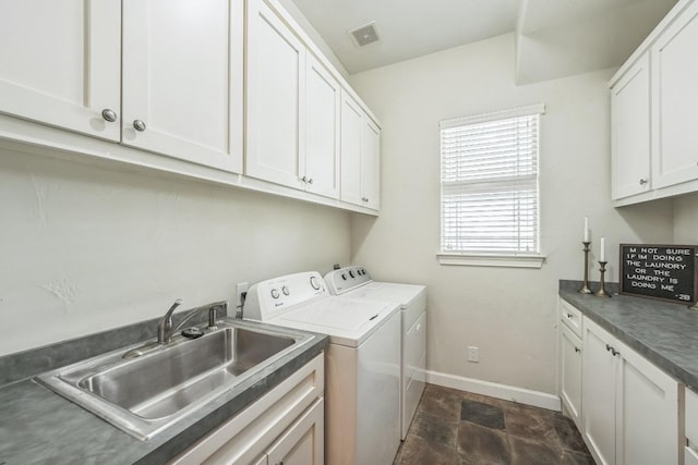 2705 Pyramid Dr, Austin, TX 78734 - laundry room with cabinet space and separate washer and dryer
