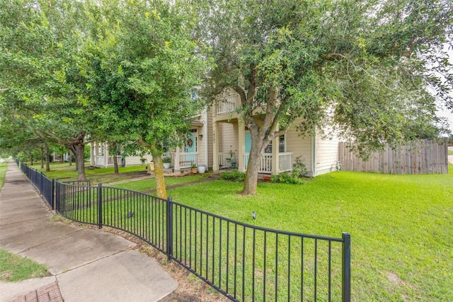 18701 Golden Eagle Way, Elgin, TX 78621 - view of front of property featuring a porch and a fenced front yard