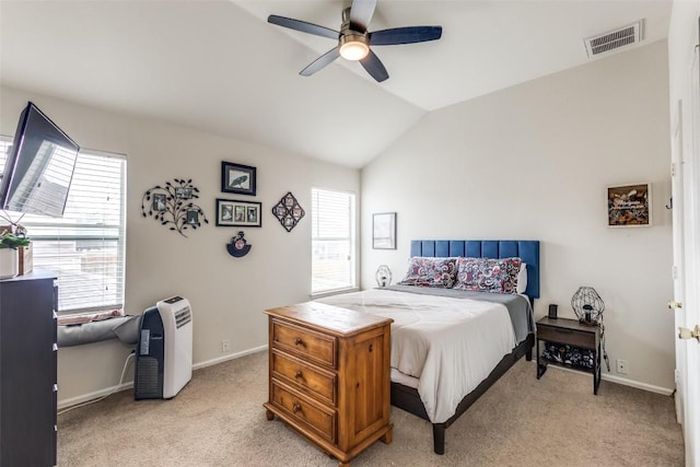 18701 Golden Eagle Way, Elgin, TX 78621 - bedroom with light carpet, vaulted ceiling, and a ceiling fan