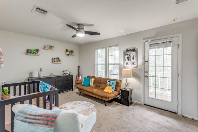 18701 Golden Eagle Way, Elgin, TX 78621 - carpeted bedroom with access to outside and a ceiling fan