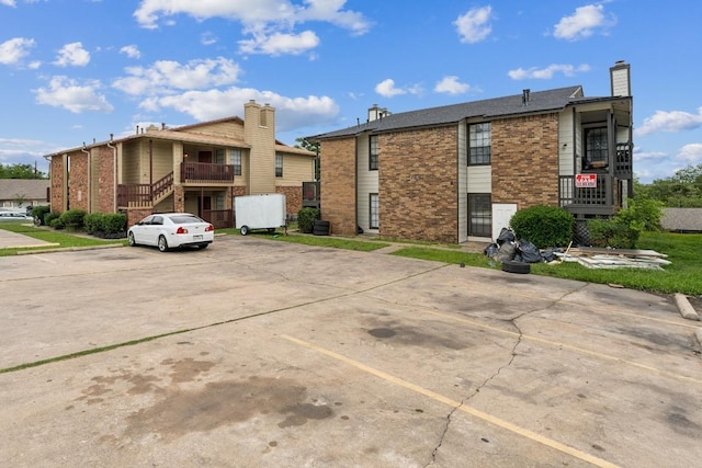 11303 Nicole Cv, Austin, TX 78753 - view of building exterior with uncovered parking