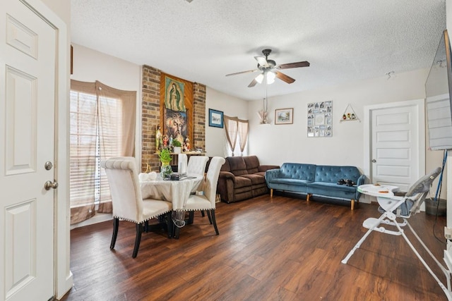 11303 Nicole Cv, Austin, TX 78753 - dining room featuring a textured ceiling, wood finished floors, and a ceiling fan