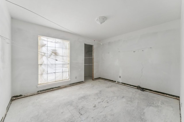 11303 Nicole Cv, Austin, TX 78753 - spare room with unfinished concrete flooring