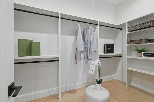2711 Pegram, Austin, TX 78757 - walk in closet with wood finished floors