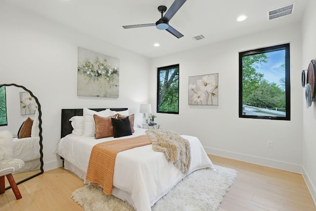 2711 Pegram, Austin, TX 78757 - bedroom with light wood-style flooring, recessed lighting, and ceiling fan