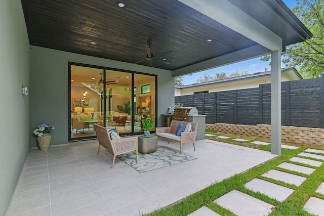 2711 Pegram, Austin, TX 78757 - view of patio featuring a ceiling fan and an outdoor kitchen