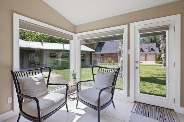 2401 Manana St, Austin, TX 78730 - sunroom featuring vaulted ceiling and tile patterned flooring