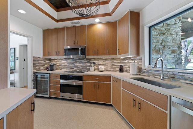 2401 Manana St, Austin, TX 78730 - kitchen with appliances with stainless steel finishes, wine cooler, and light countertops