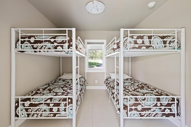2401 Manana St, Austin, TX 78730 - bedroom with tile patterned floors