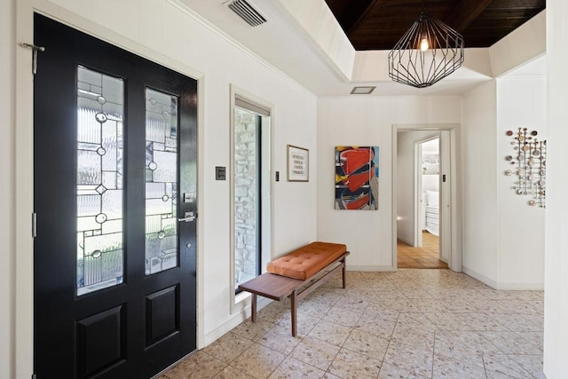 2401 Manana St, Austin, TX 78730 - entrance foyer with a chandelier and baseboards