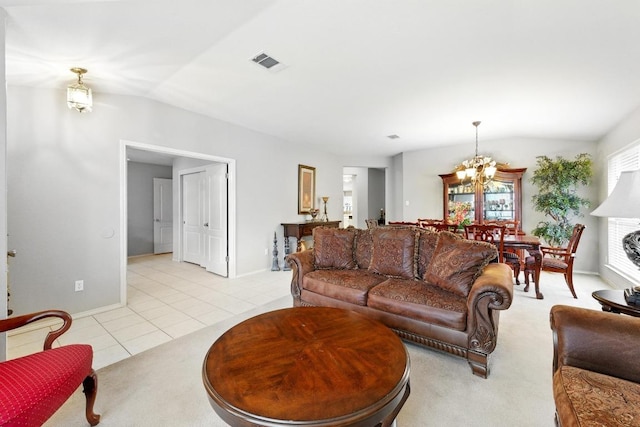 9602 Tea Rose Trl, Austin, TX 78748 - living room with lofted ceiling, a chandelier, light colored carpet, and light tile patterned floors