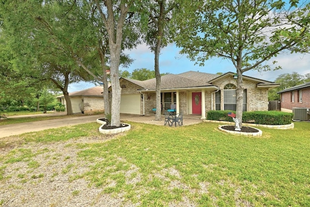 9602 Tea Rose Trl, Austin, TX 78748 - ranch-style house with concrete driveway, an attached garage, a front lawn, and brick siding