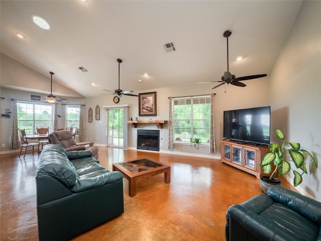 209 Old Sayers Rd, Elgin, TX 78621 - living area with ceiling fan, finished concrete flooring, plenty of natural light, recessed lighting, and high vaulted ceiling