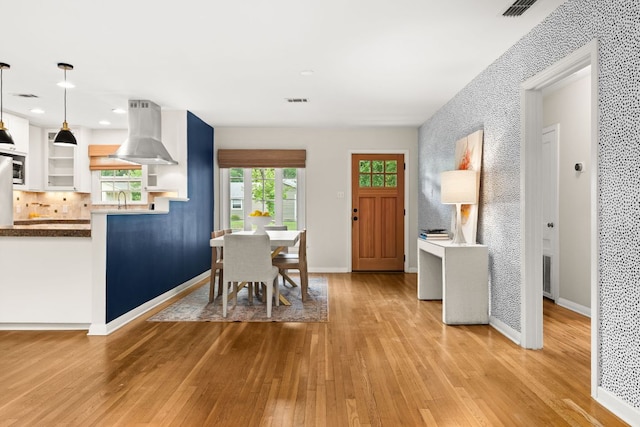 5212 Valley Oak Dr, Austin, TX 78731 - dining area featuring light wood-style flooring and recessed lighting