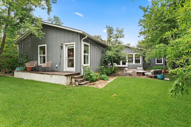 5212 Valley Oak Dr, Austin, TX 78731 - back of property with a yard and board and batten siding
