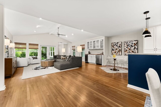 5212 Valley Oak Dr, Austin, TX 78731 - living room featuring light wood-style floors, ceiling fan, and beverage cooler